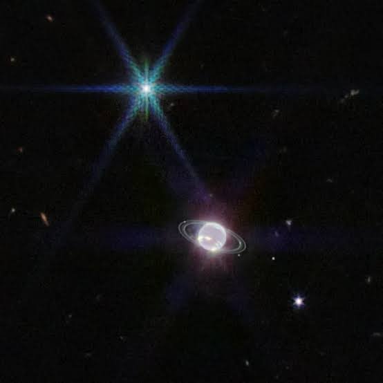 Webb Telescope Uncovers Evidence of Ancient Collision That Reshaped Neptune’s Moons
